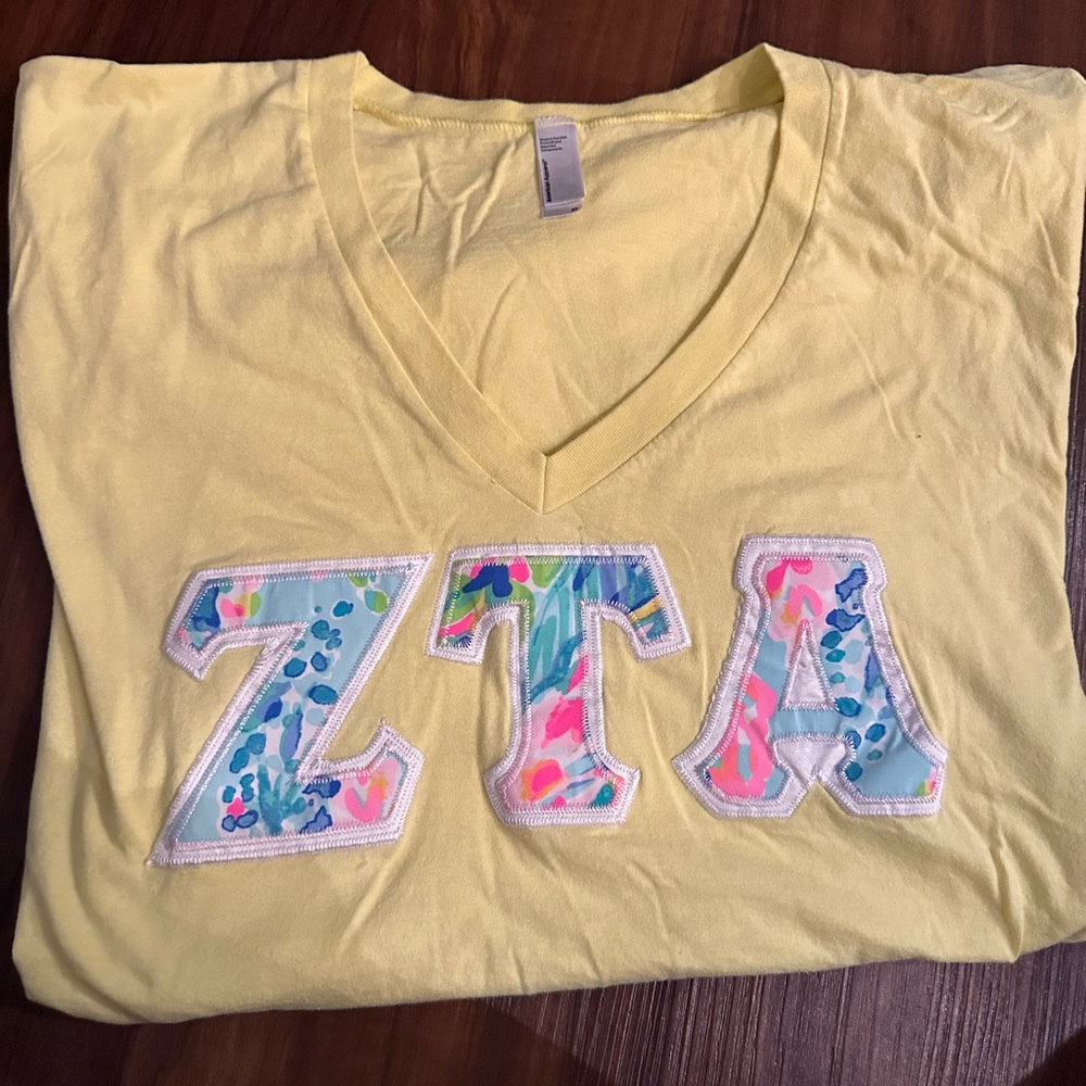 Zeta Tau Alpha (ZTA) v-neck stitched letters